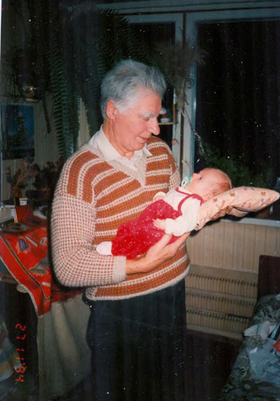 1995. Yuri Rogachev is 70; (with grandson)
